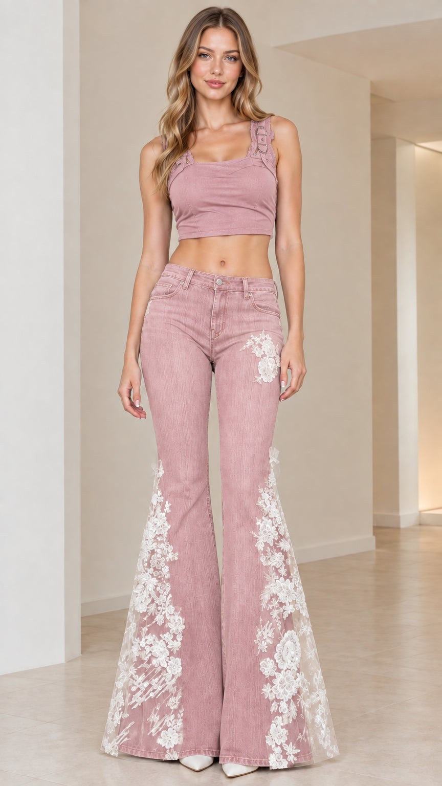 Front view of Dusty Pink flare jeans with matching crop top and white lace flare inserts