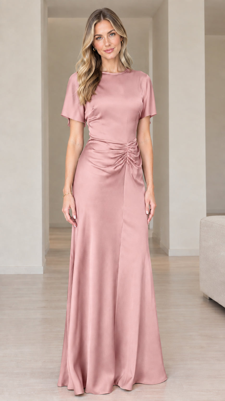 Front view of woman wearing dusty rose pink short sleeve satin maxi dress
