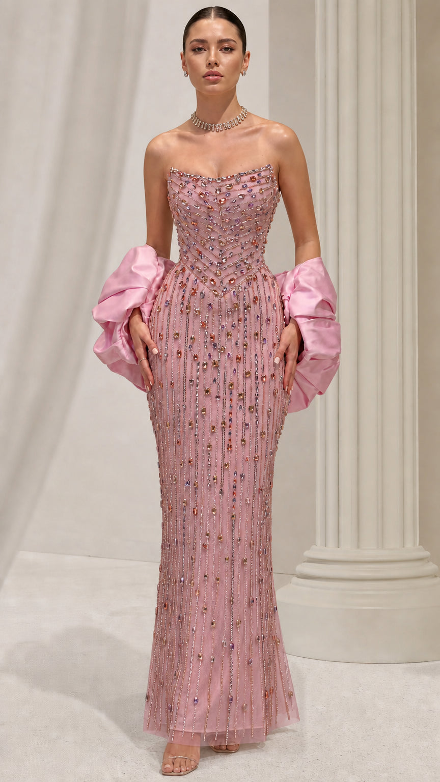 Blush pink strapless crystal beaded evening gown with matching pink sleeve bands