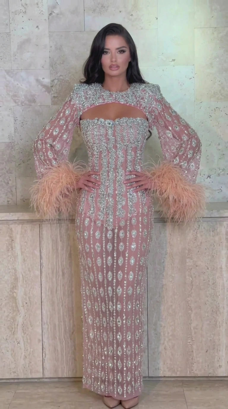 Blush Pink beaded cutout evening gown with feather cuffs