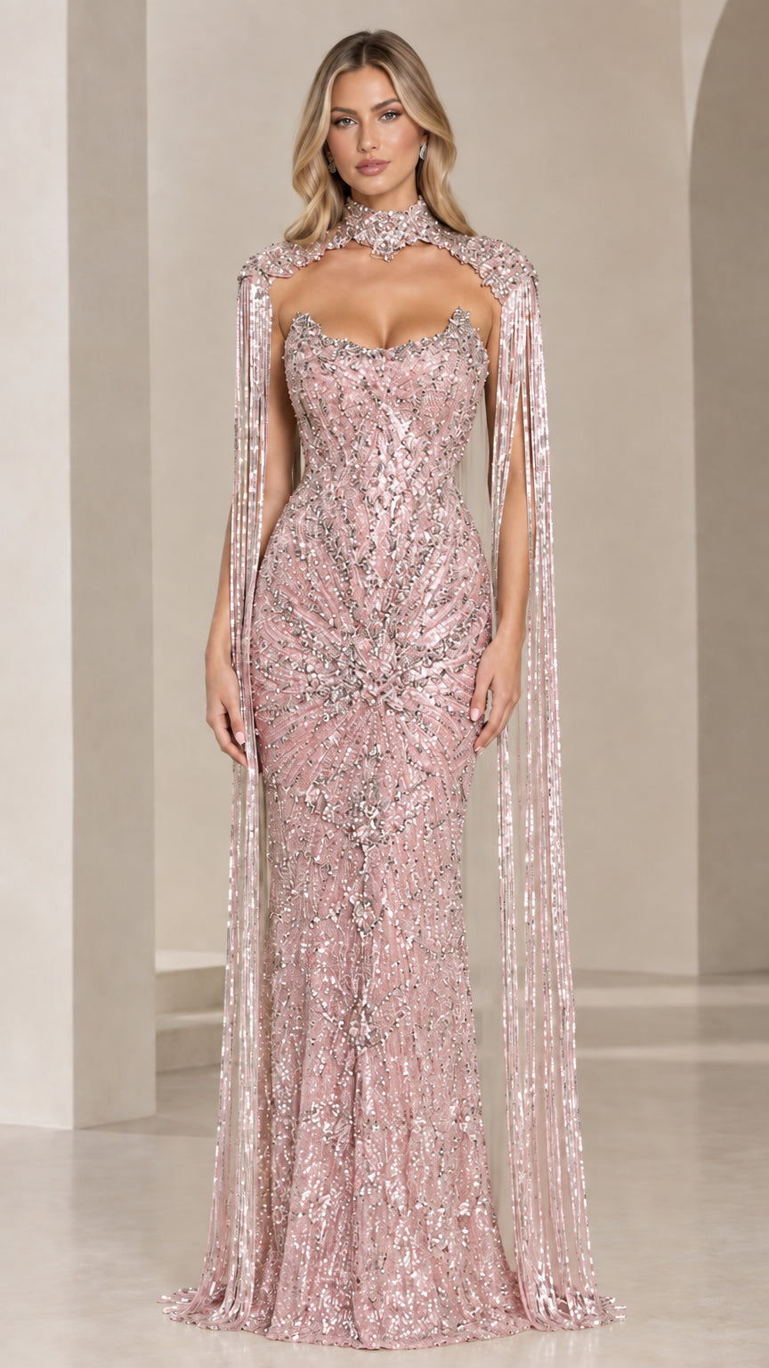 Front view of blush pink beaded cape evening gown with intricate sequin and bead patterns