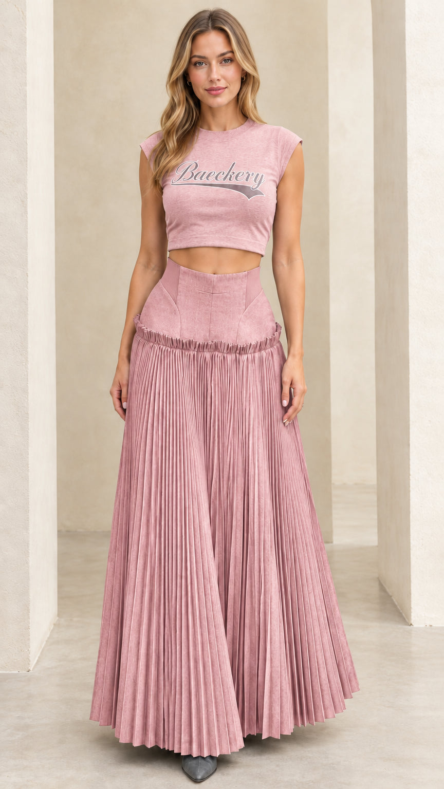 Full front view of dusty pink two-piece cropped tee and pleated maxi skirt set