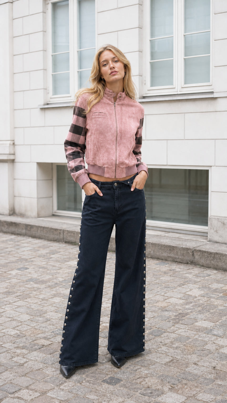 Model wearing Dusty Pink faux suede cropped jacket with striped sleeves