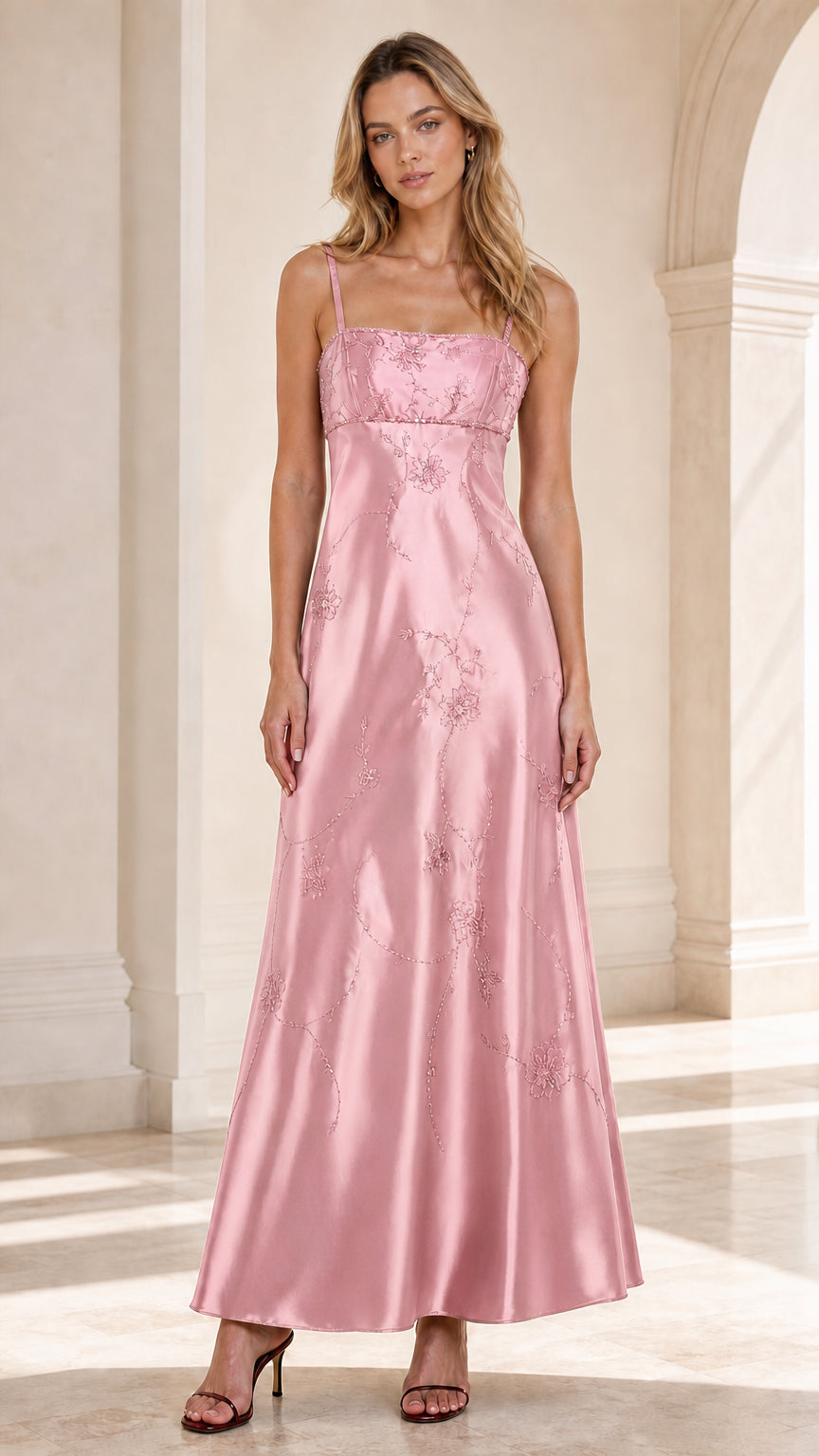 Front view of woman wearing Blush Pink embroidered satin maxi gown