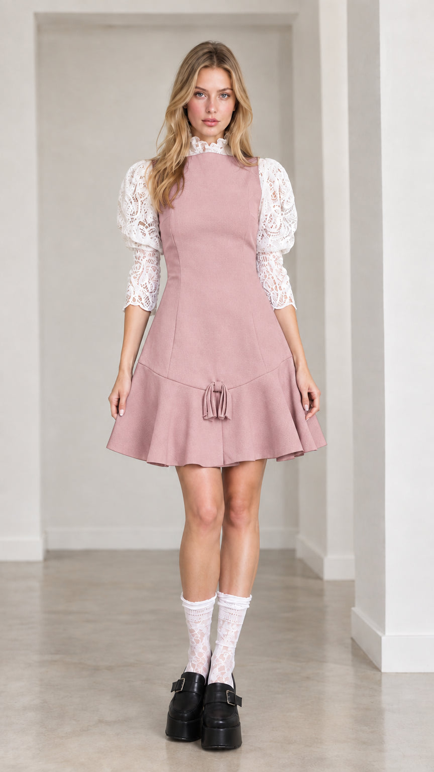 Front view of dusty pink contrast lace sleeve mini dress with ruffle hem