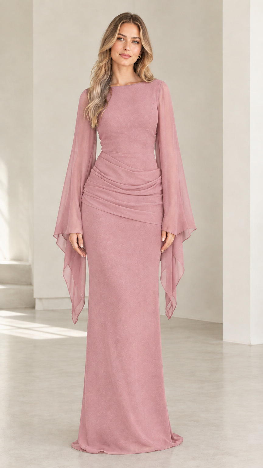Model wearing dusty rose draped bell sleeve ruched evening gown