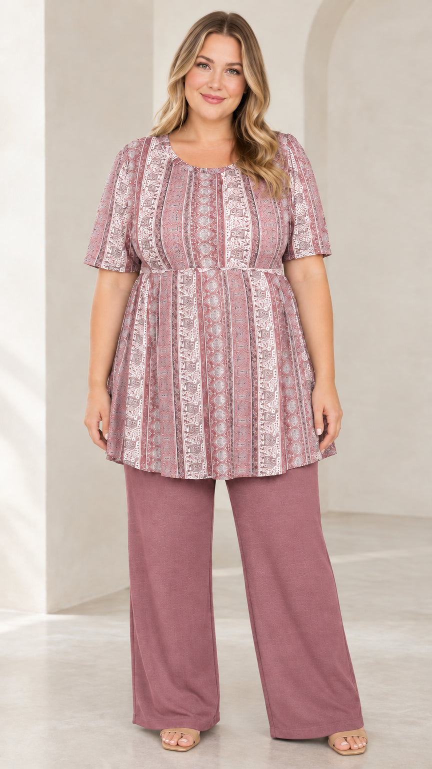 Model wearing Dusty Rose bohemian print tunic top with matching mauve wide leg trousers