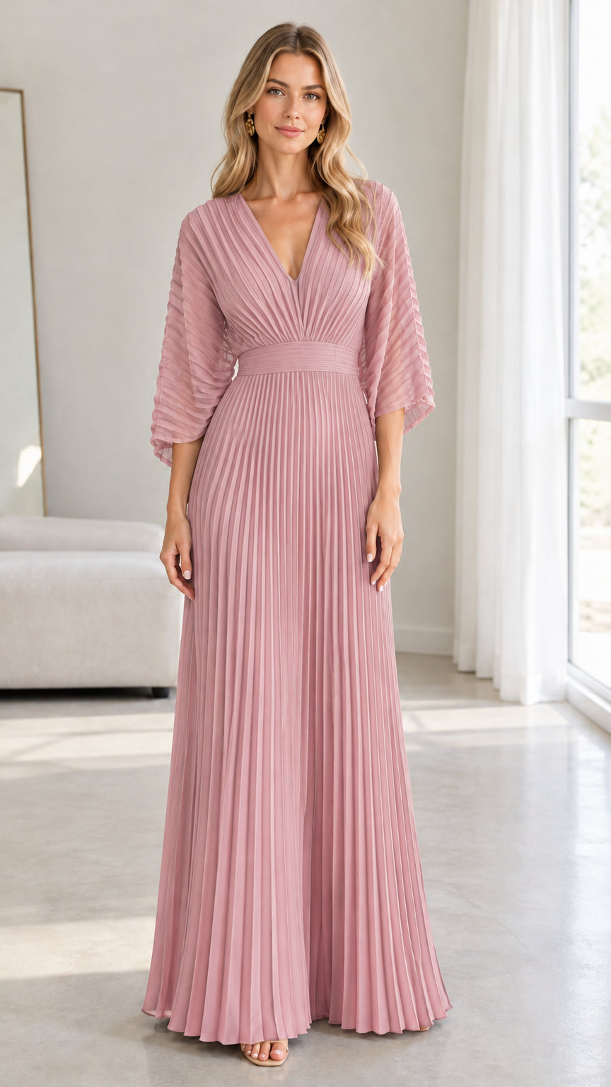 Front view of model wearing the dusty pink pleated maxi evening dress