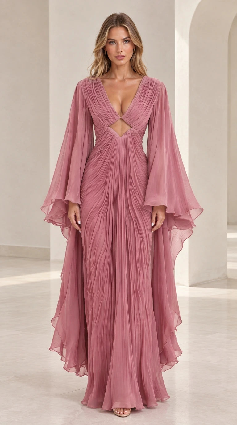 Front view of model wearing dusty pink pleated formal maxi dress with waist cutout