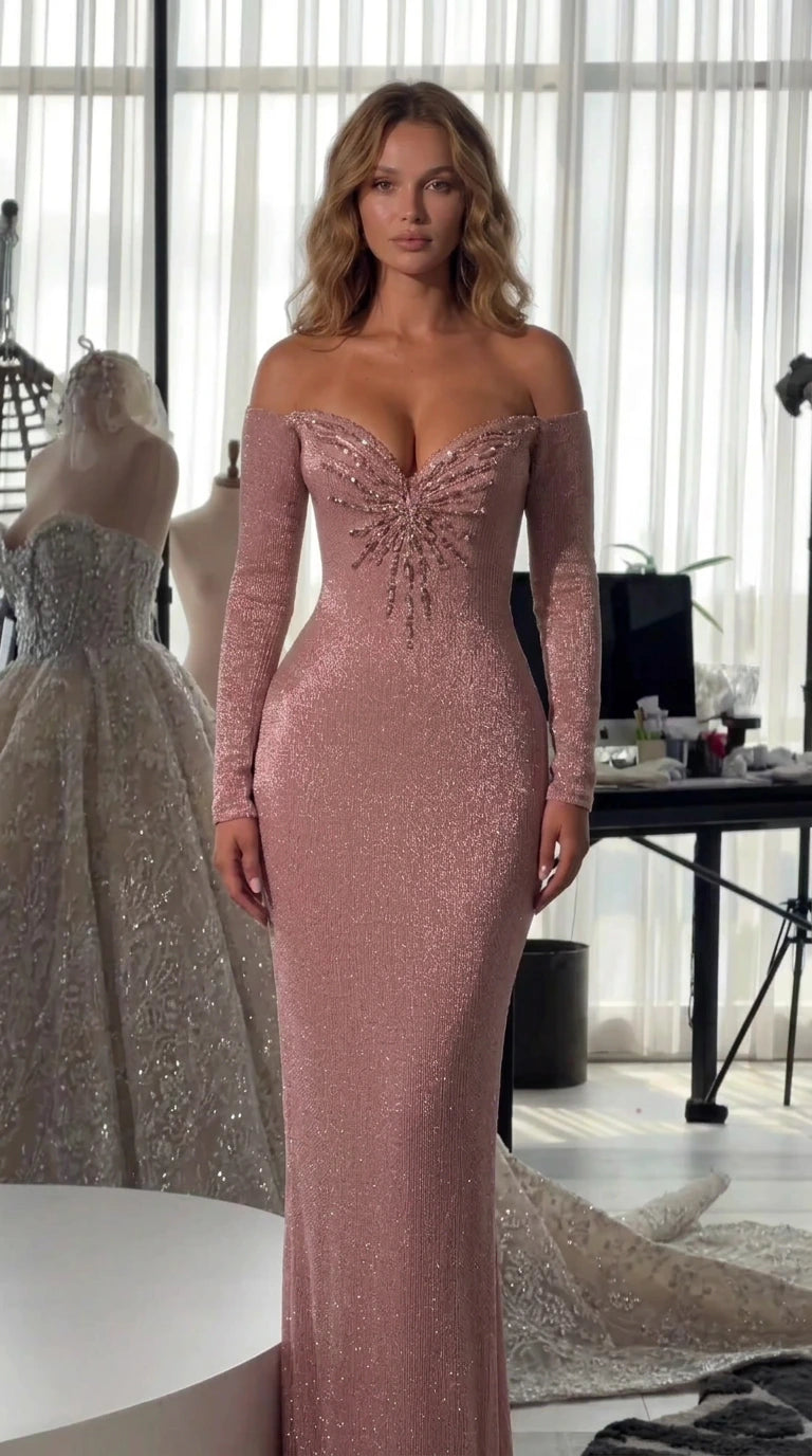 Front view of model wearing dusty pink long-sleeve evening gown