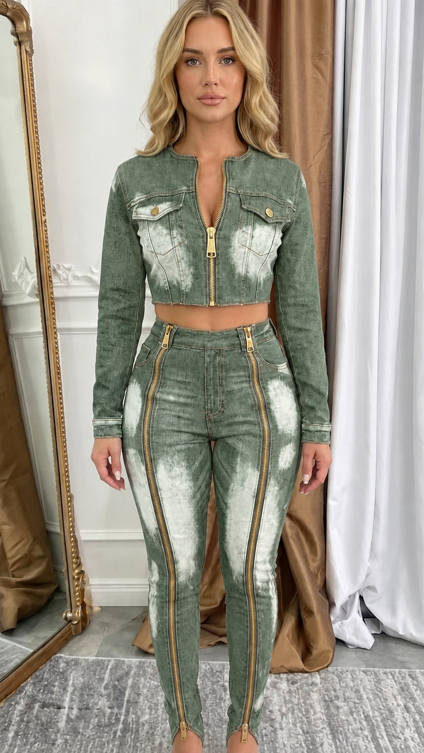 Model wearing olive green acid wash cropped denim jacket and front zip skinny pants set