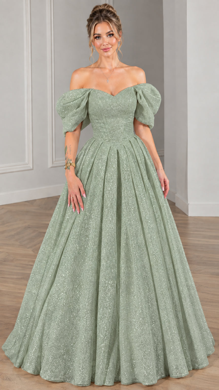 Model wearing sage green glitter sweetheart puff-sleeve ball gown