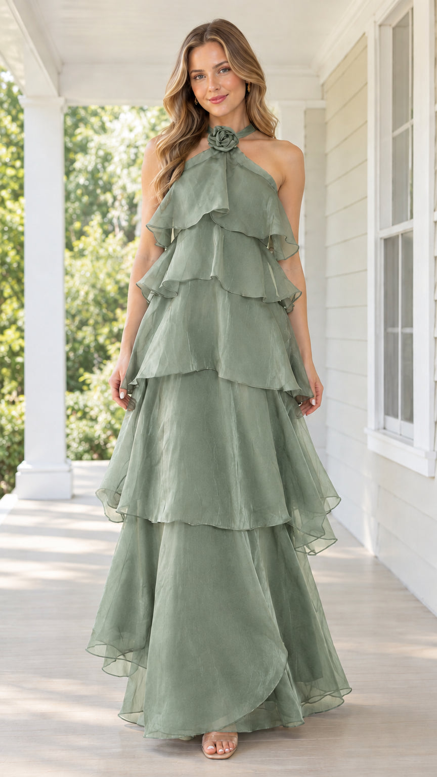 Front view of sage green tiered halter maxi dress with floral collar