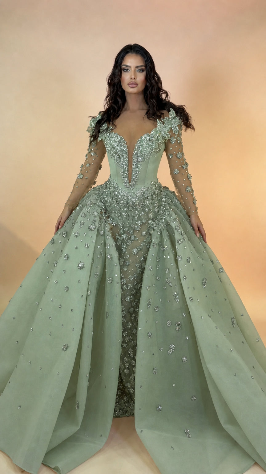 Full front view of sage green beaded illusion neckline evening gown