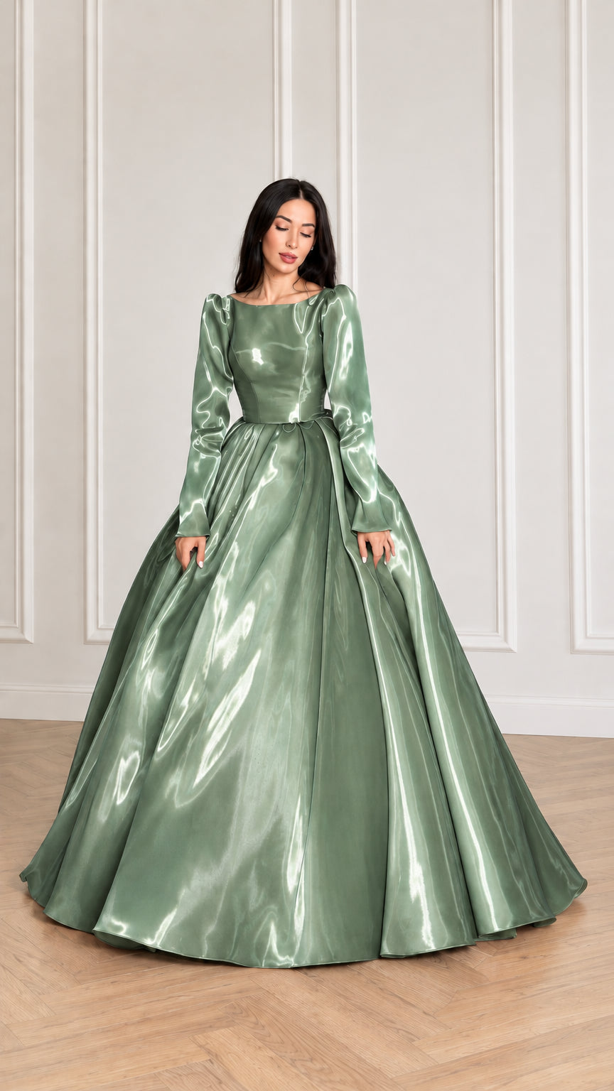 Front view of model wearing sage green glossy long sleeve satin ball gown