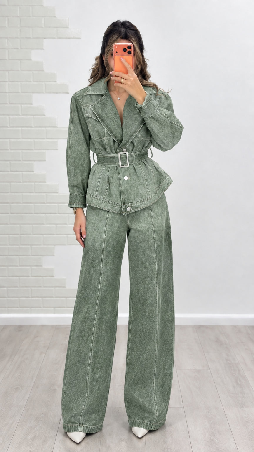 Model wearing sage green belted denim jacket and matching wide-leg pants set