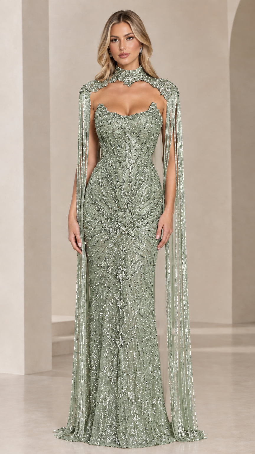 Front view of sage green beaded cape evening gown with cascading fringe sleeves