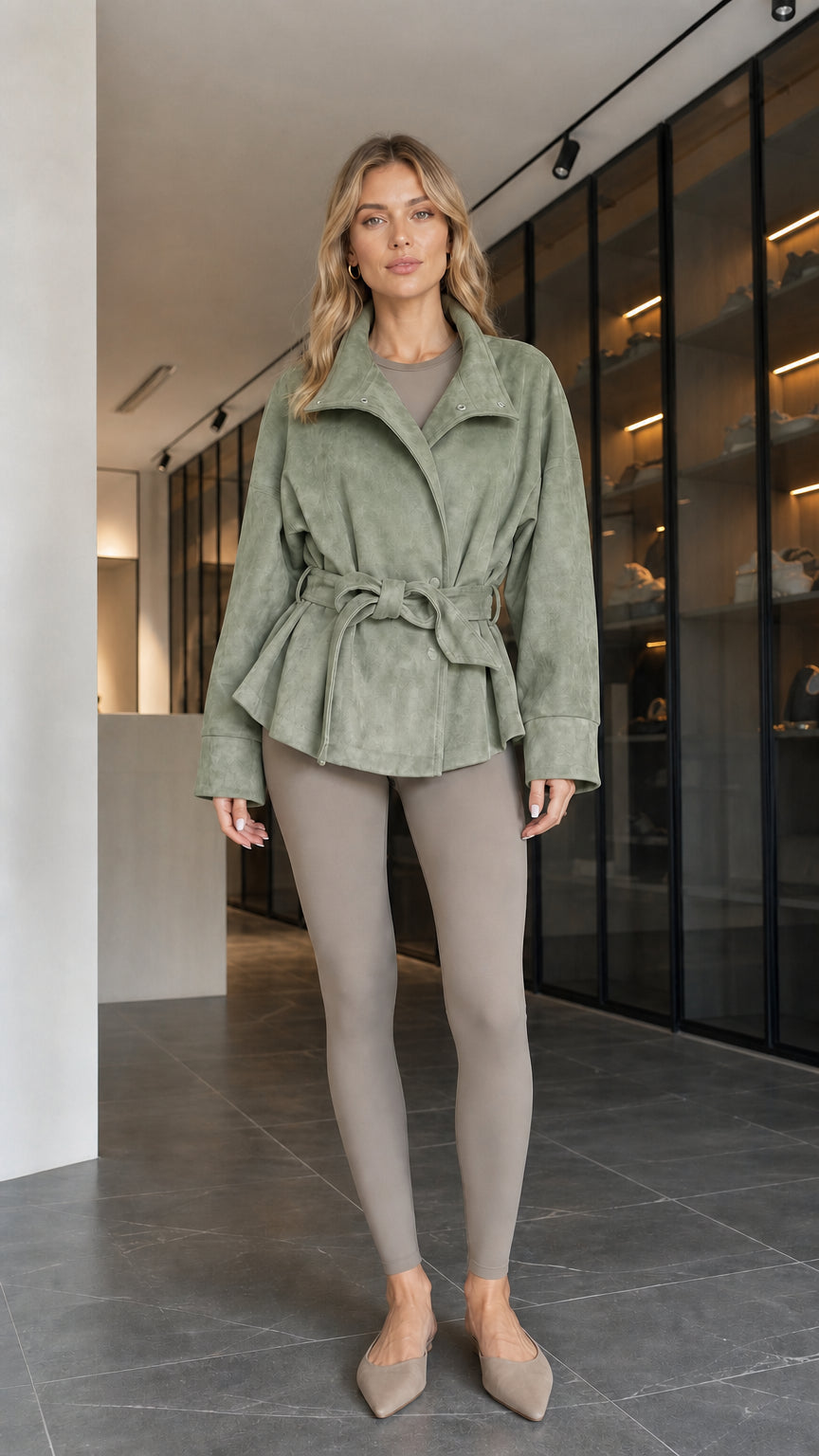 Model wearing sage green faux suede belted wrap jacket