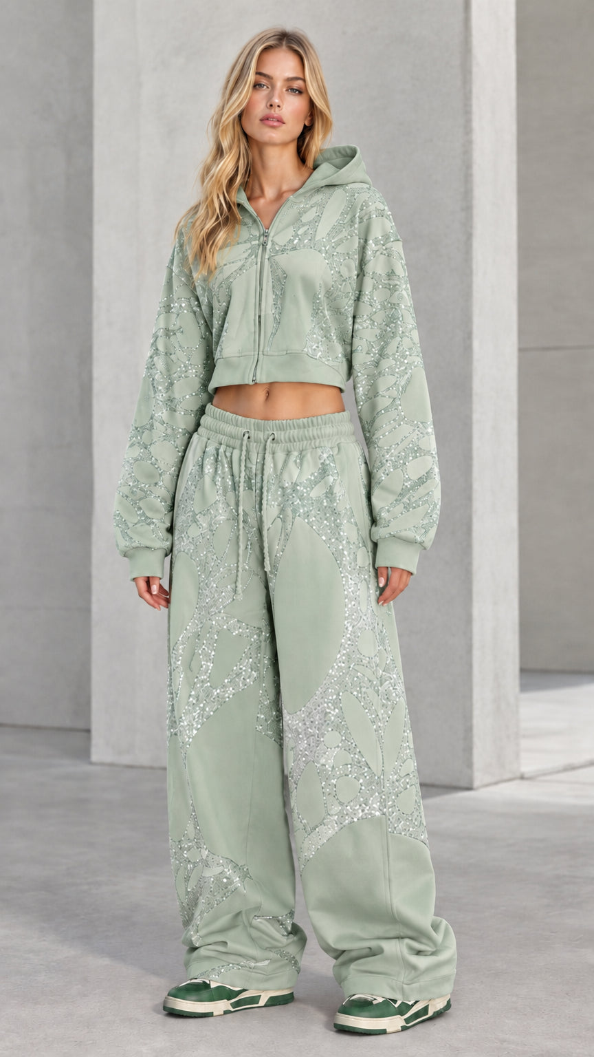 Full-body view of model wearing Sage Green rhinestone cropped hoodie and sweatpants set
