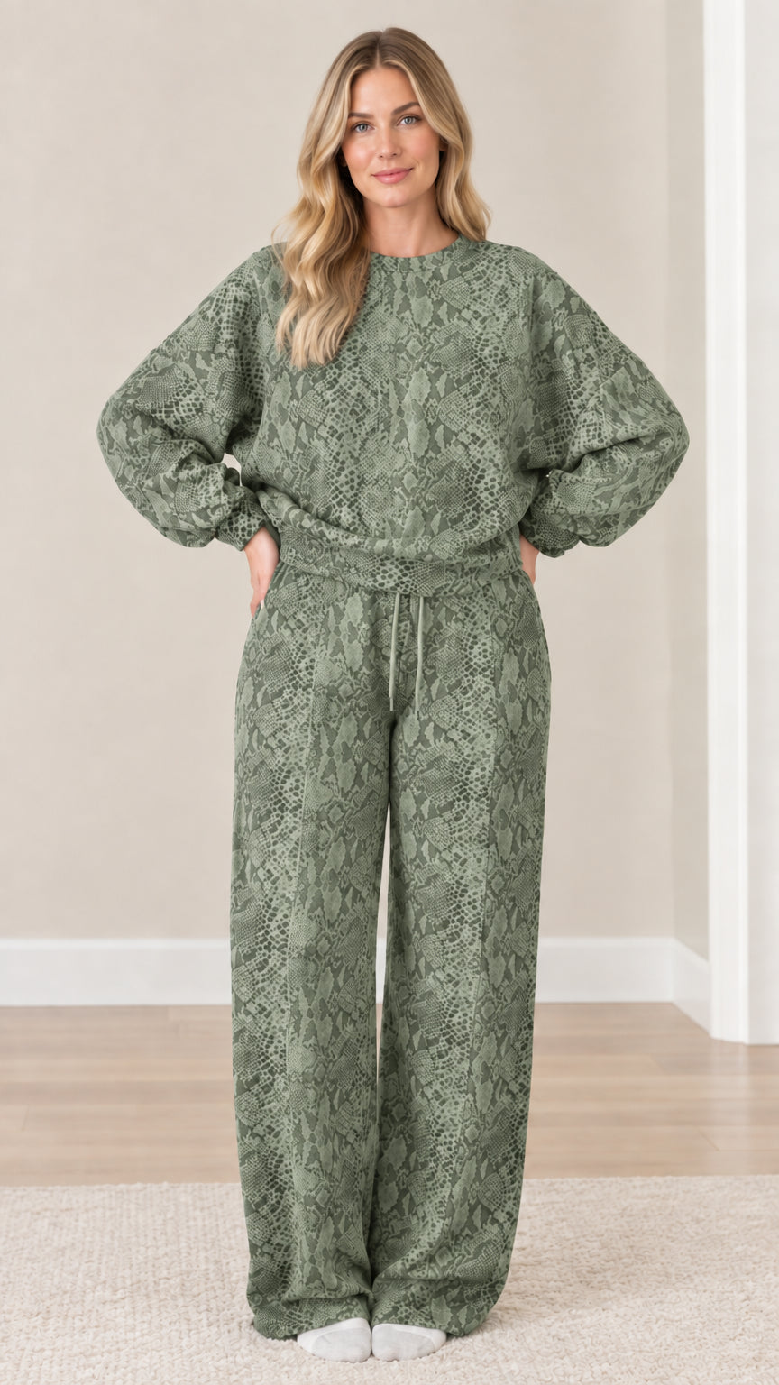 Front view of model wearing sage green snakeskin print two-piece matching lounge set