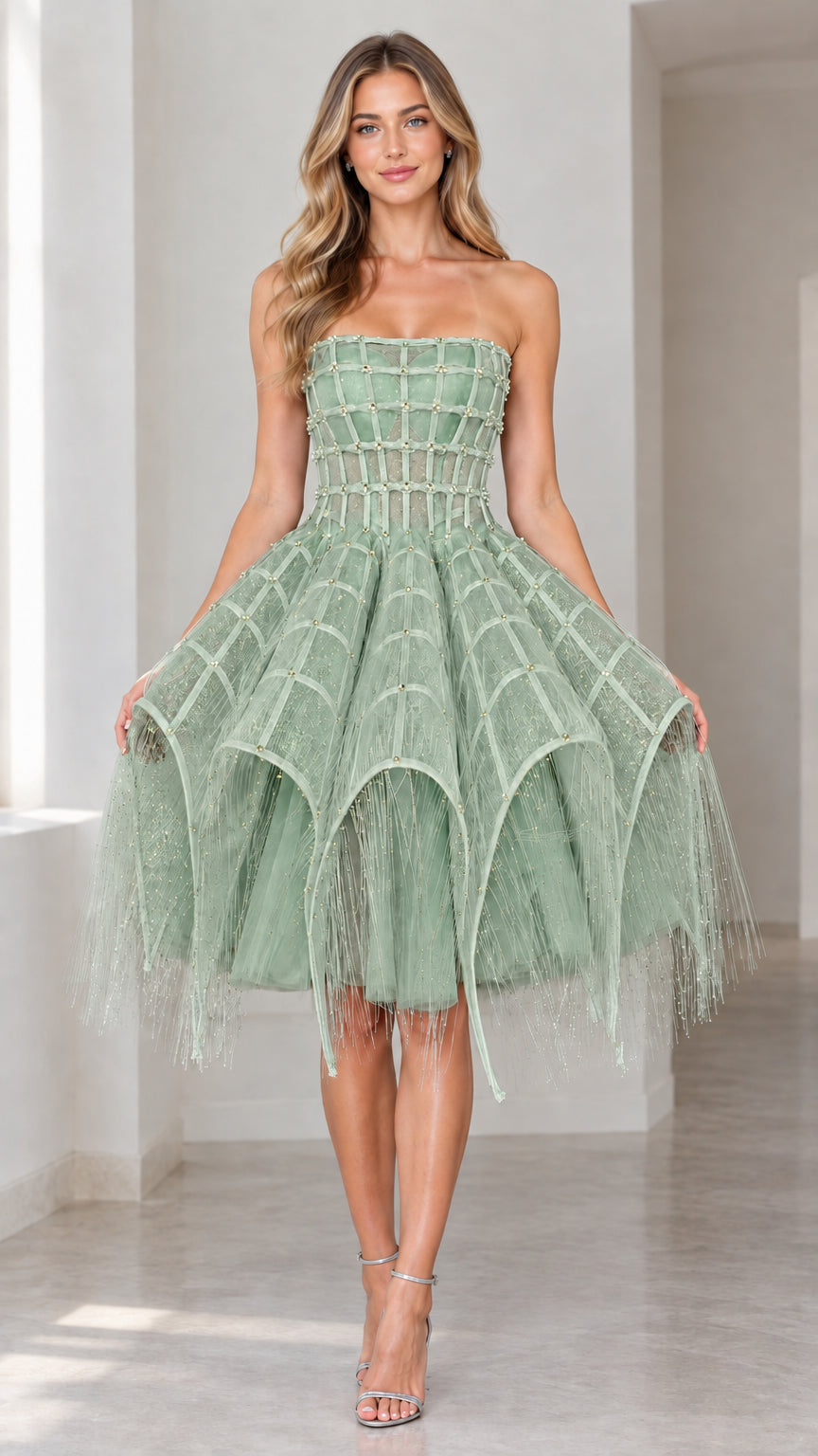 Front view of sage green strapless embellished corset cocktail dress with tiered fringed skirt