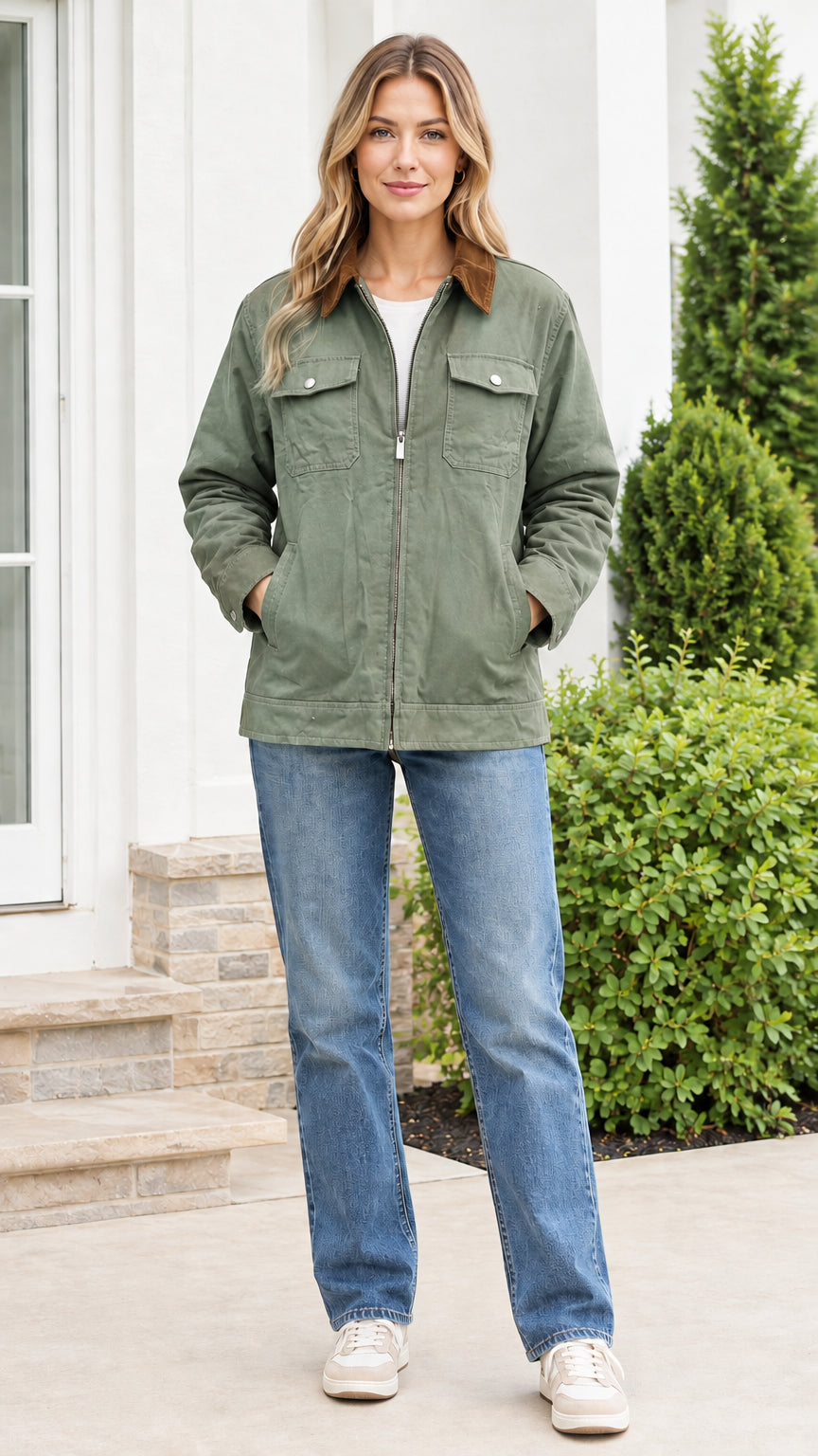 Front view of model wearing the sage green canvas utility jacket with brown corduroy collar
