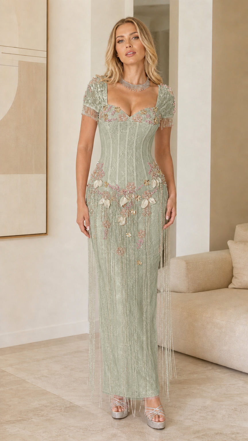 Model wearing Sage Green beaded fringe corset evening dress