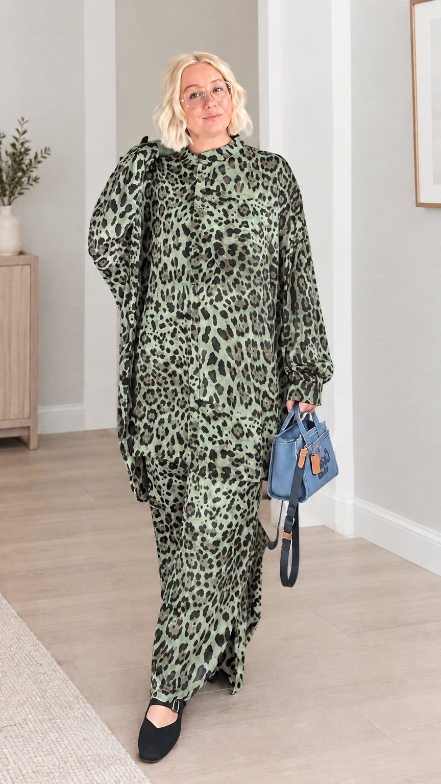 Front full-length view of model wearing the sage green leopard print two-piece pant set