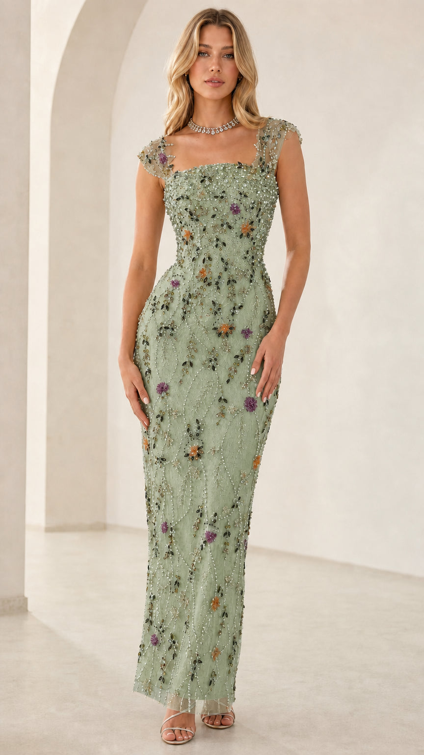 Model wearing sage green embellished square neck maxi gown