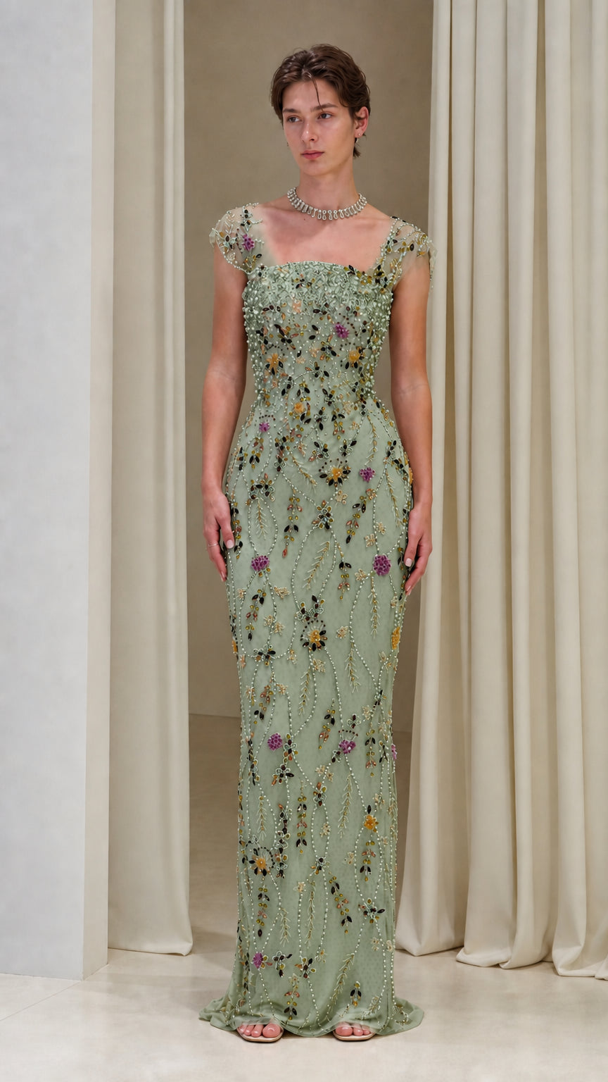 Sage green beaded floor-length formal gown