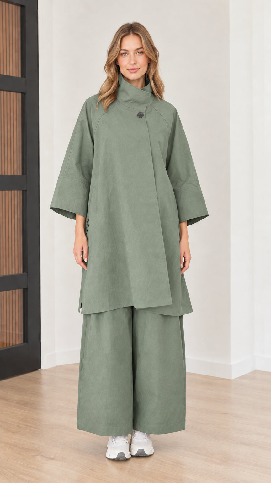 Front full view of women's mock neck tunic top and wide-leg pants two-piece set in sage green