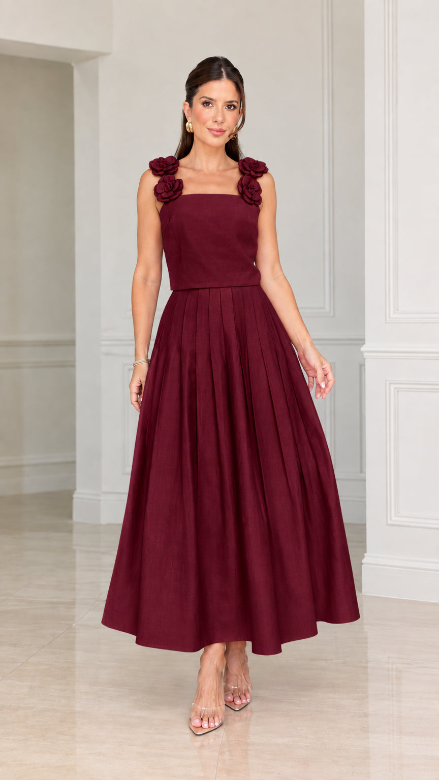 Front view of woman wearing burgundy wine floral strap pleated midi dress