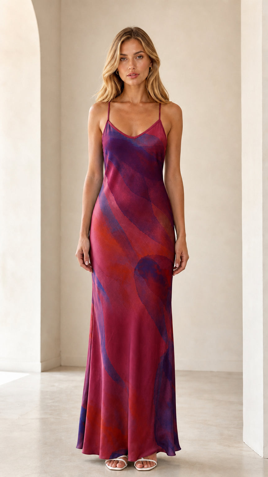 Model wearing berry wine and red abstract wave satin maxi dress