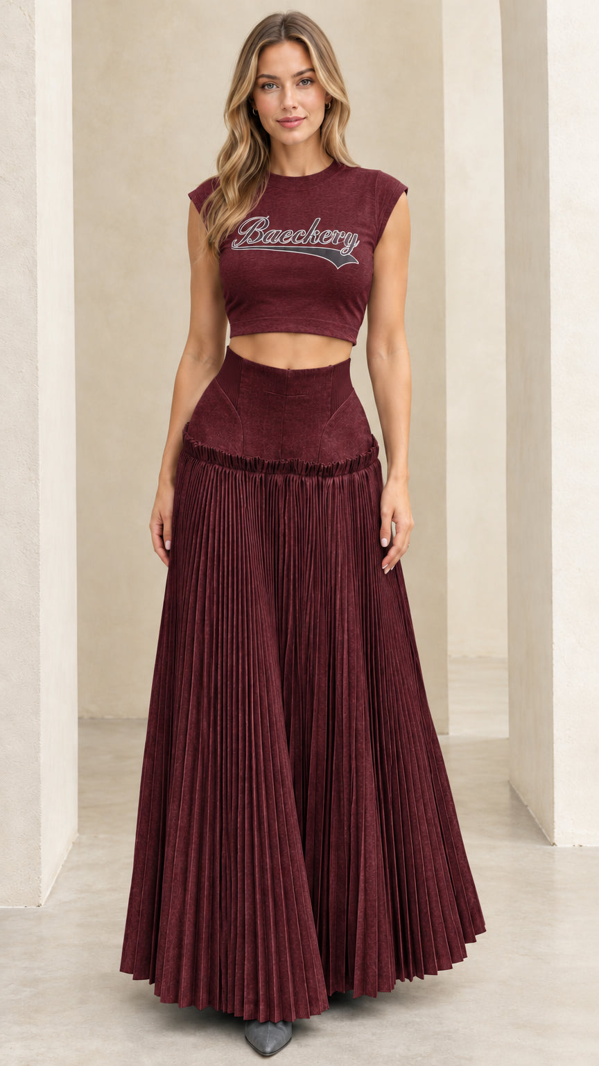 Full front view of burgundy wine two-piece cropped tee and pleated maxi skirt set
