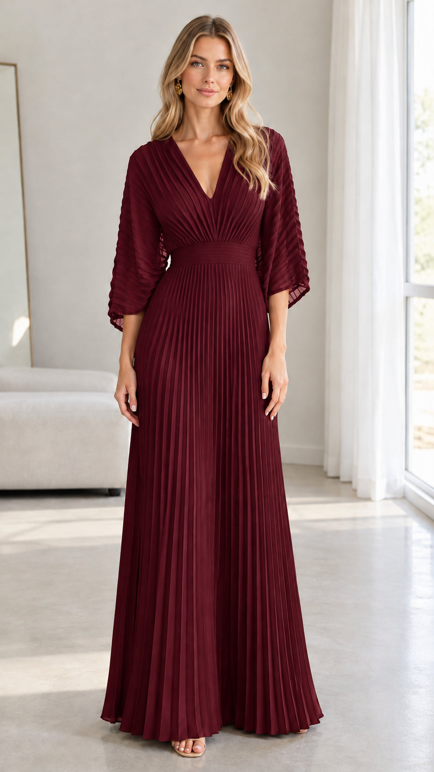 Front view of model wearing the burgundy red pleated maxi evening dress
