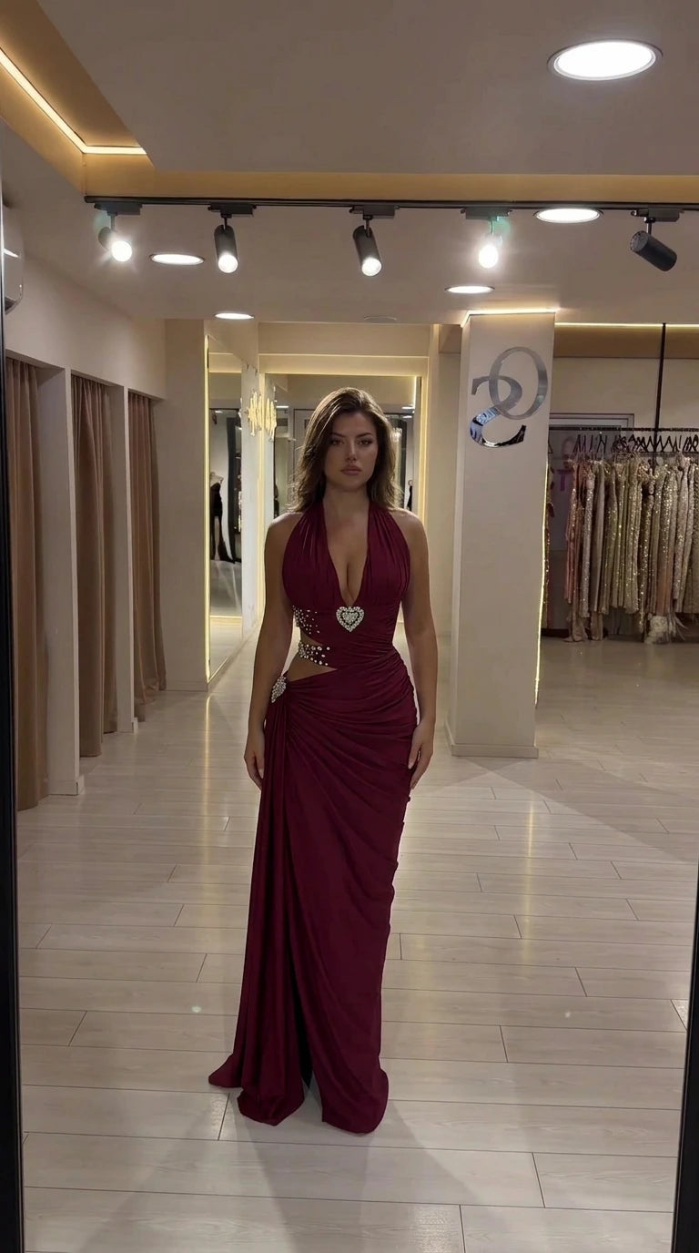 Burgundy wine red halter ruched evening maxi gown on model