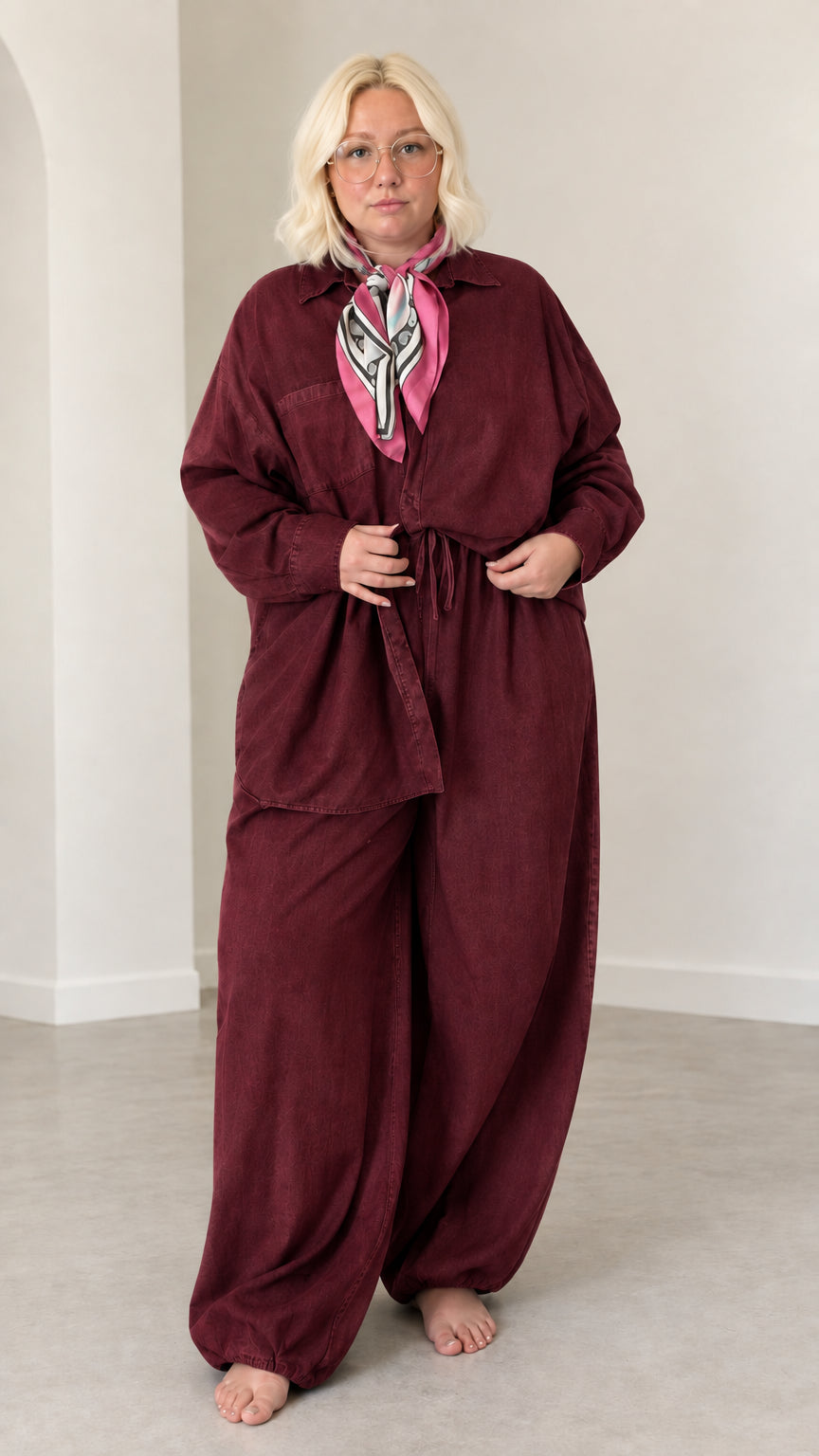 Front full-length view of model wearing Burgundy relaxed shirt and drawstring pants set