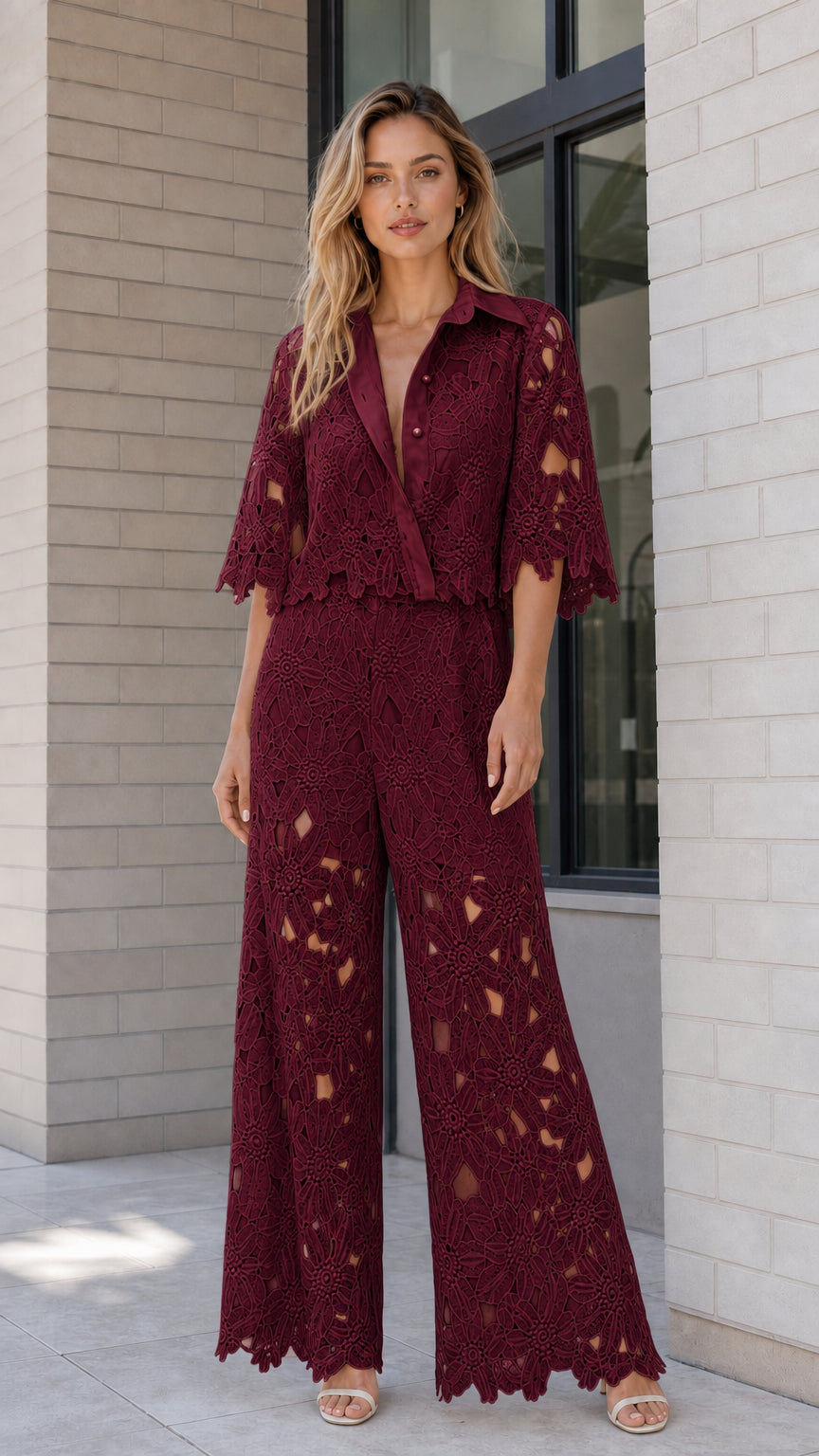 Model wearing burgundy wine floral lace collared top and wide-leg pant set