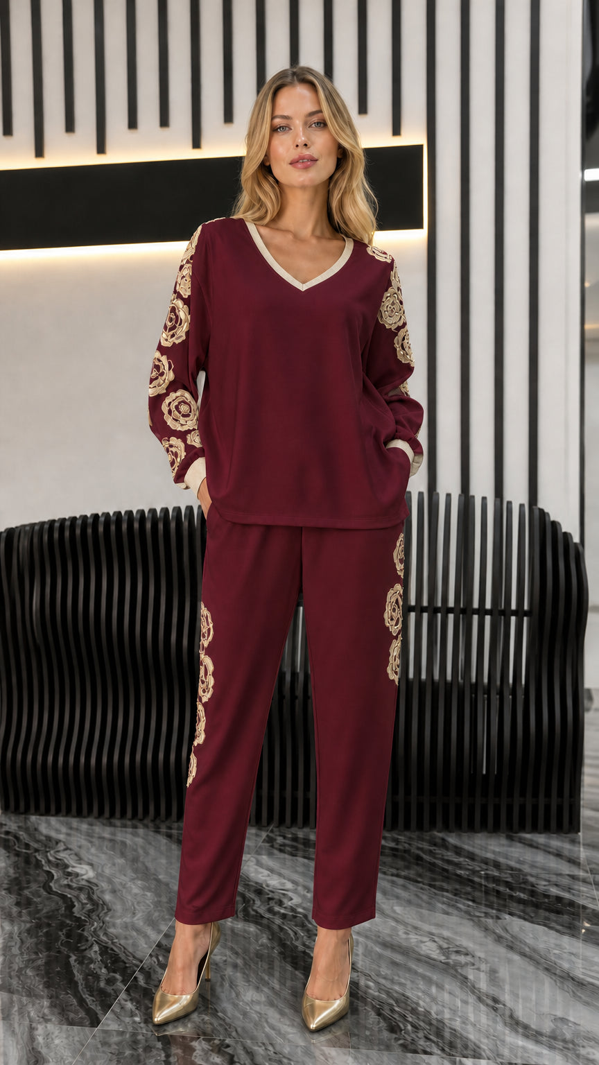 Front view of woman wearing burgundy wine embroidered two-piece co-ord set