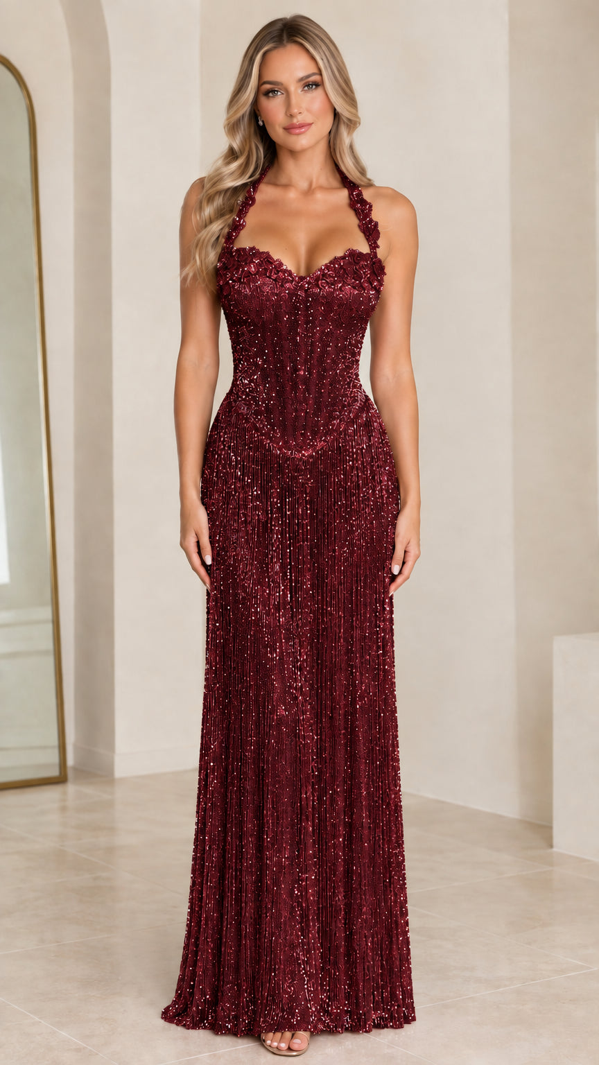 Front view of model wearing burgundy red sequin fringe corset formal set