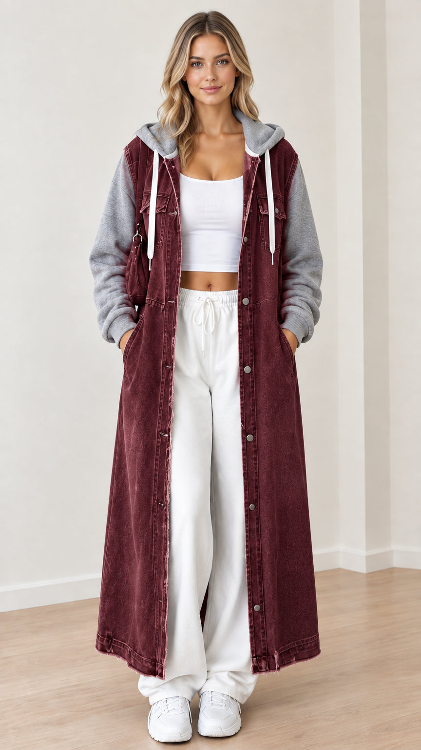 Front view of burgundy wine red maxi hooded denim coat with contrast gray sleeves