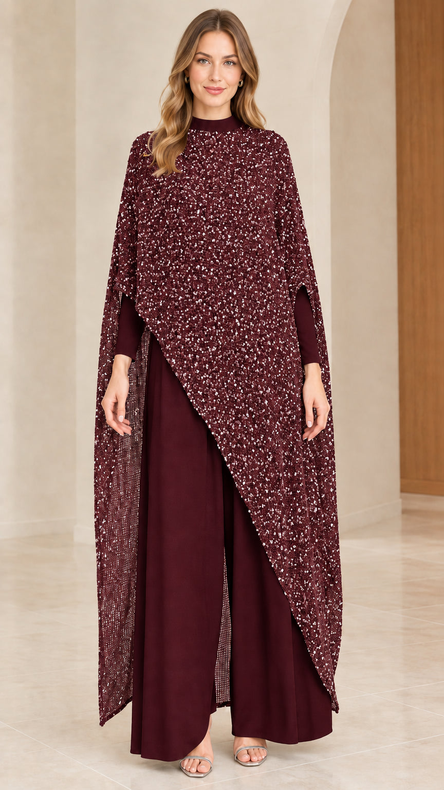 Front view of burgundy wine asymmetrical cape overlay top and wide-leg pants set