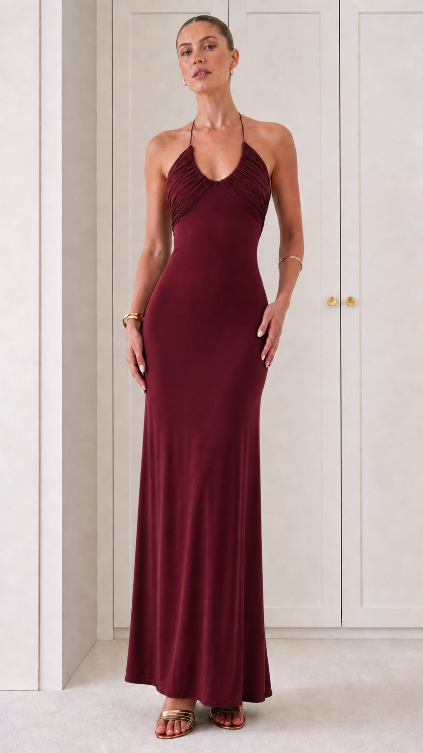 Full front view of Burgundy wine red halter neck pleated bust maxi dress