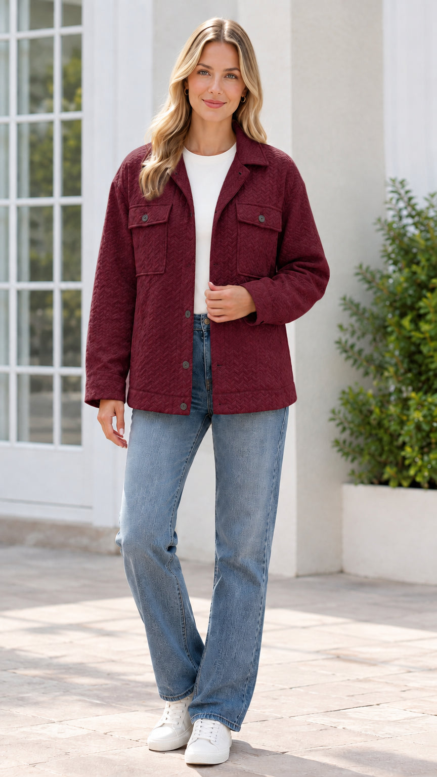 Model wearing burgundy red textured button-front shirt jacket