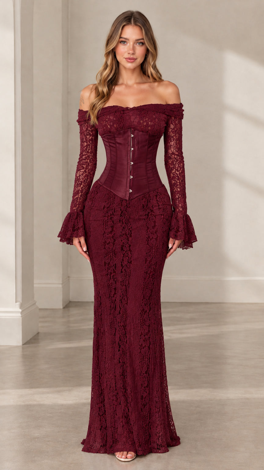 Woman wearing burgundy off-the-shoulder floral lace corset maxi dress