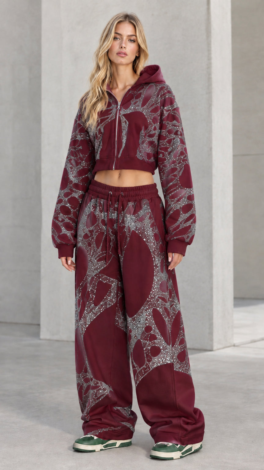 Full-body view of model wearing Burgundy rhinestone cropped hoodie and sweatpants set