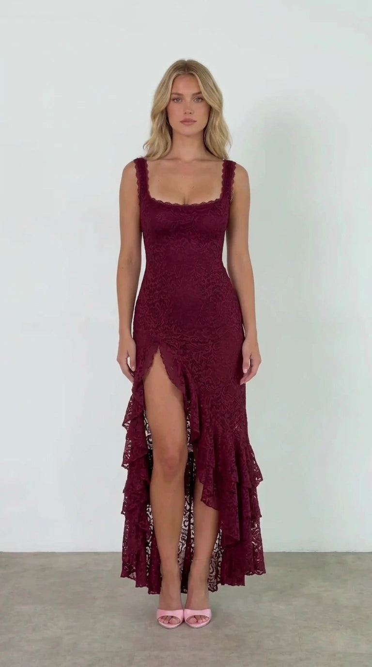 Front view of model wearing burgundy floral lace evening gown with high leg slit