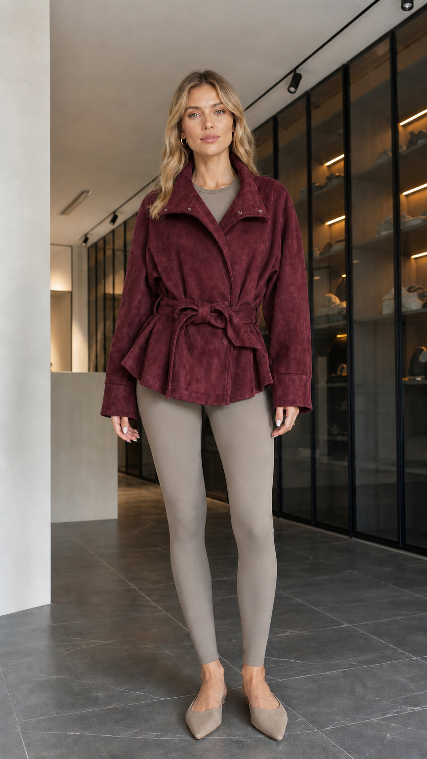 Model wearing burgundy red faux suede belted wrap jacket