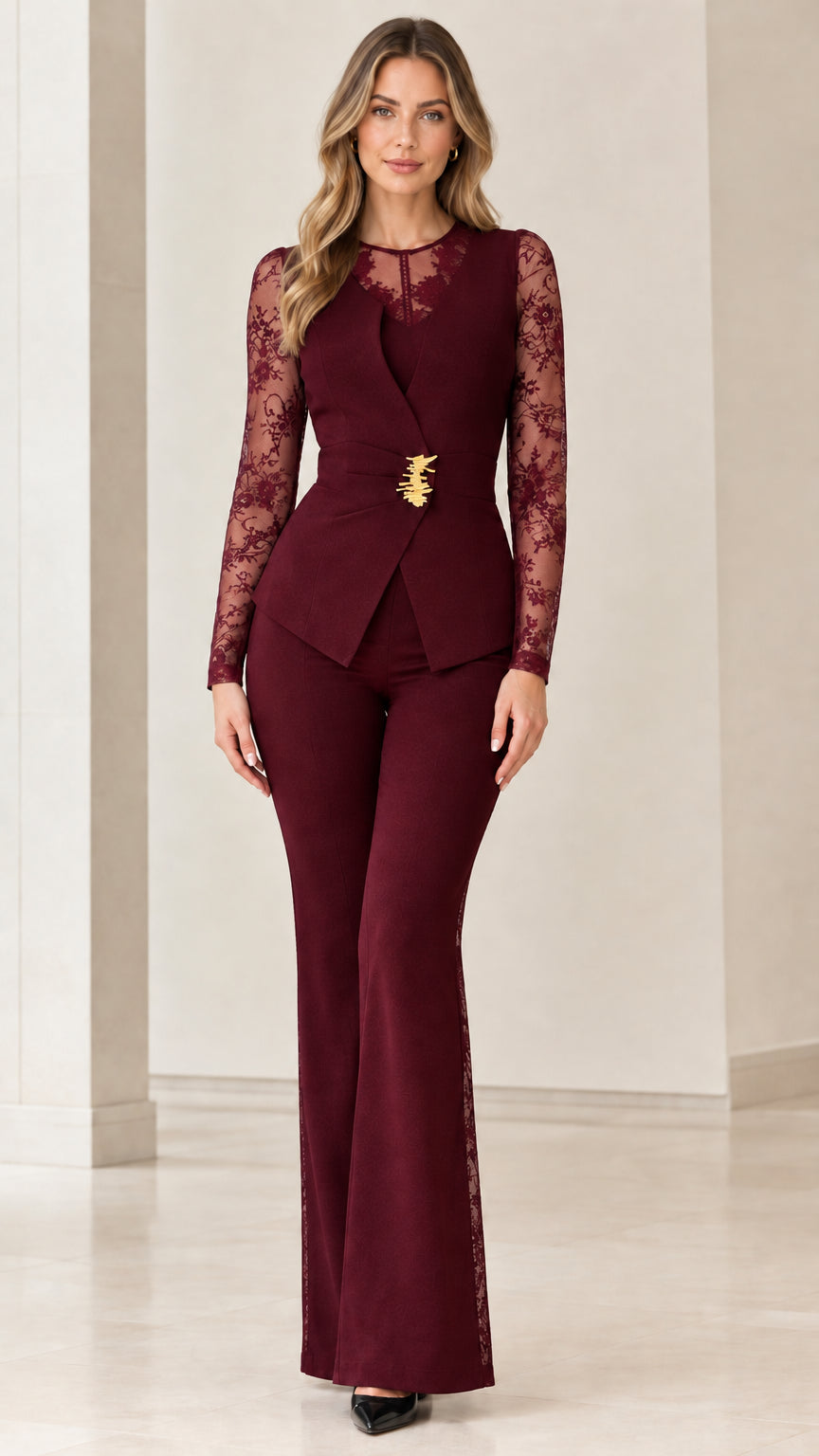 Front view of burgundy wine two-piece suit set with sheer lace sleeves and flared trousers