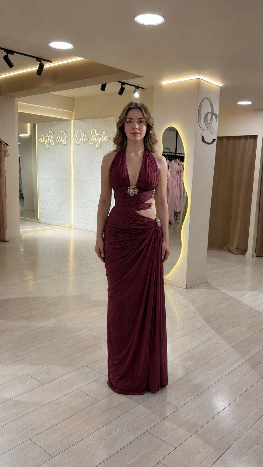 Model wearing burgundy wine halter neck ruched evening maxi dress